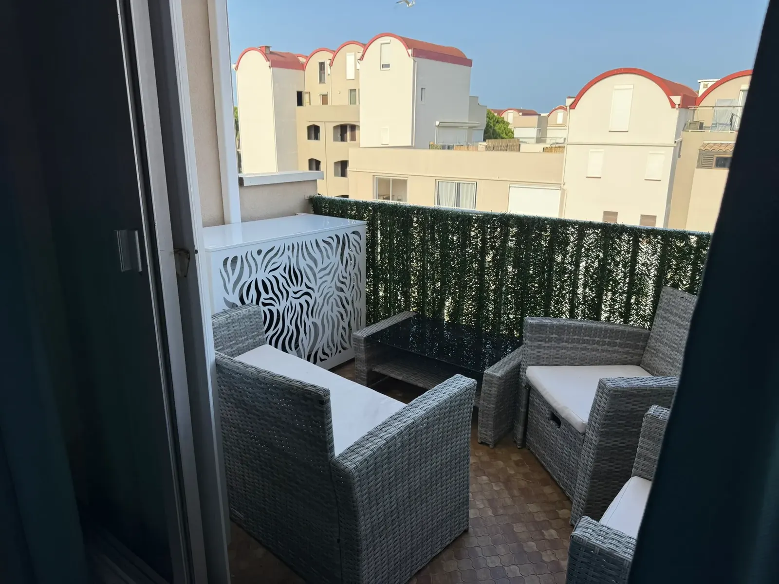 Aménagement de balcon avec cache-clim